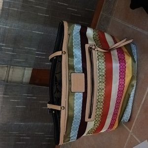 Colorful  striped coach bag .